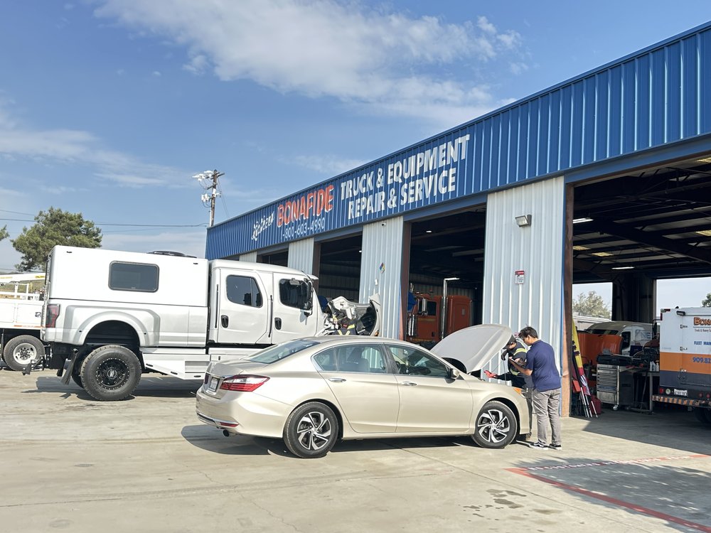 Trucks and cars at the service bays at Bonafide Truck and Equipment Repair, Cherry Valley, CA